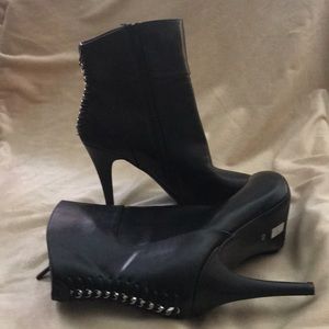 woman’s black ankle boots
